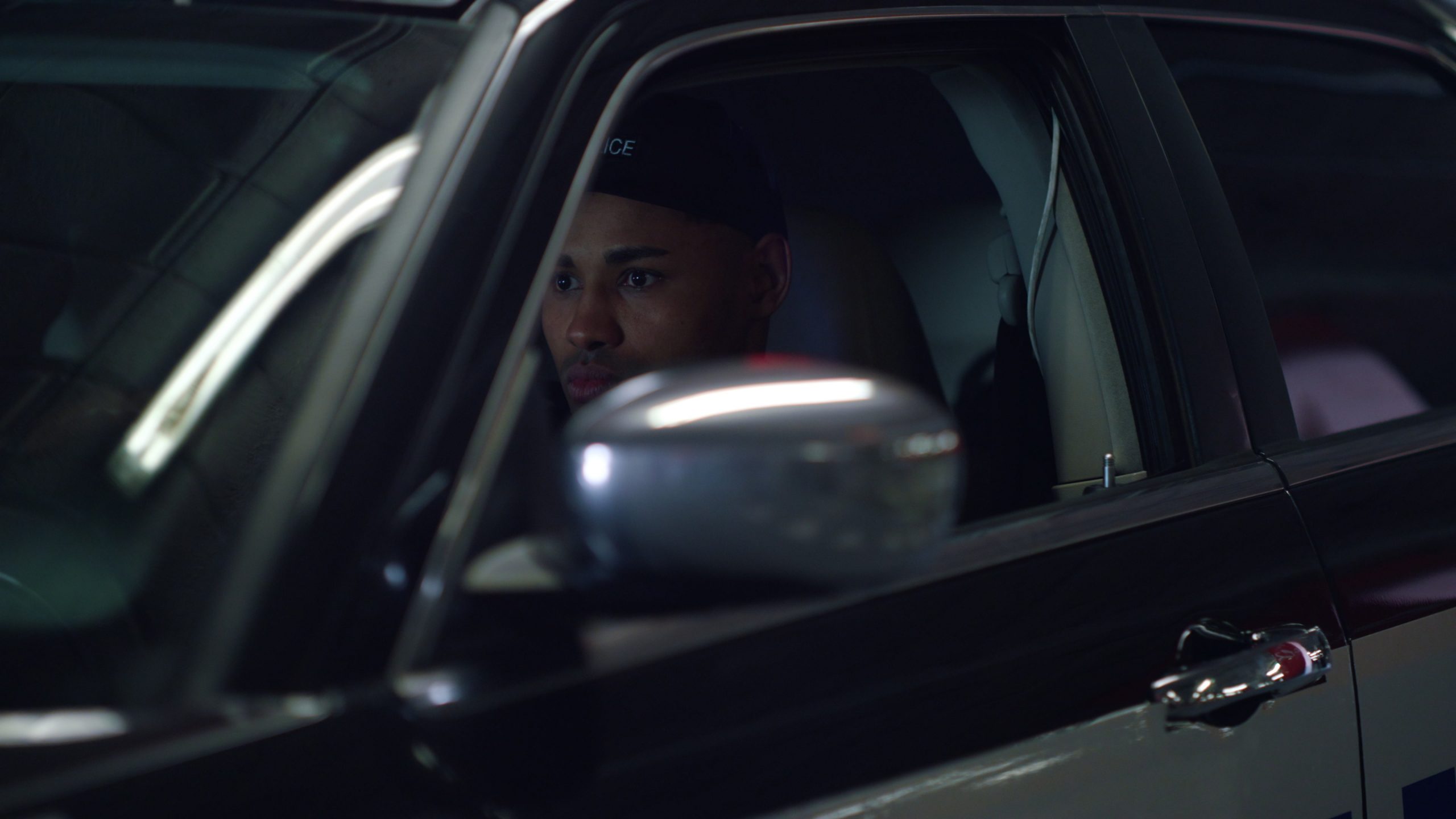 SEGLIM closeup african american police man sitting in pat 2026 01 11 08 33 01 utc